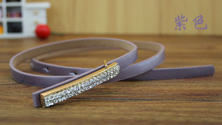 Gold buckle patent leather thin belt