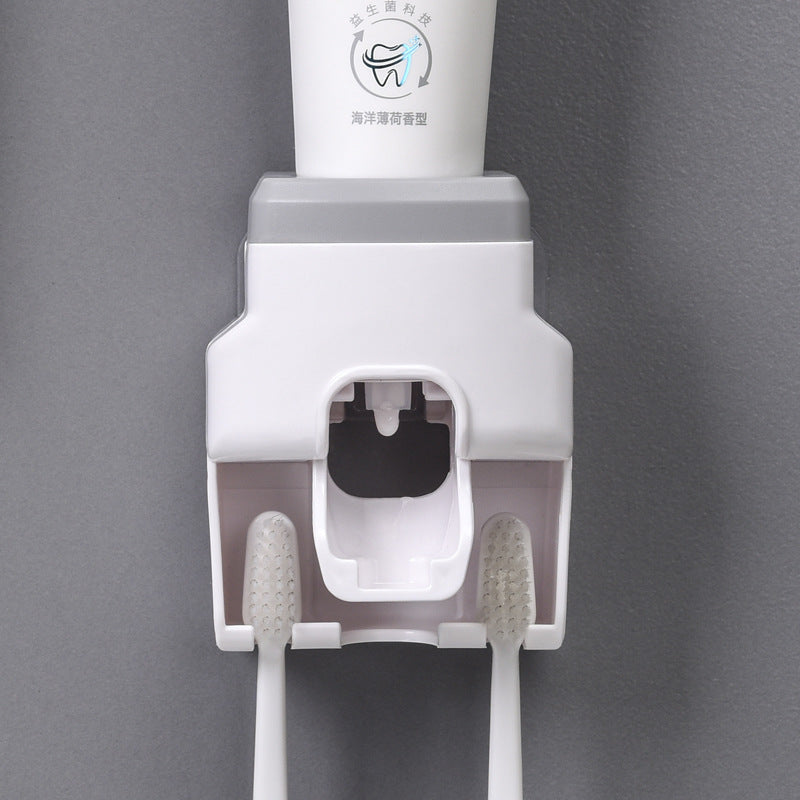 Dispensador de pasta de dientes Soporte para cepillos de dientes montado en la pared