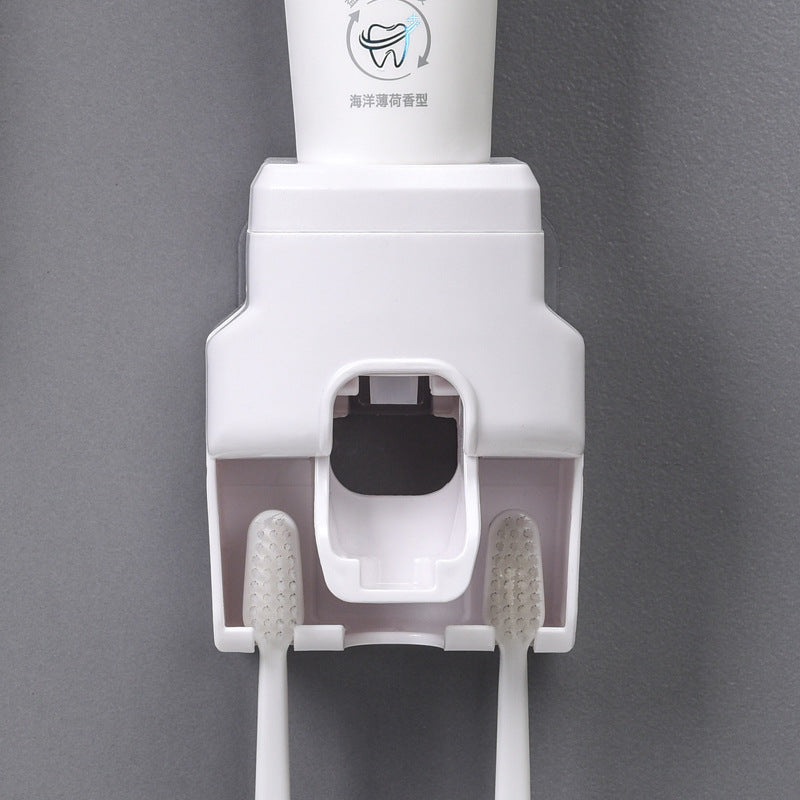 Dispensador de pasta de dientes Soporte para cepillos de dientes montado en la pared
