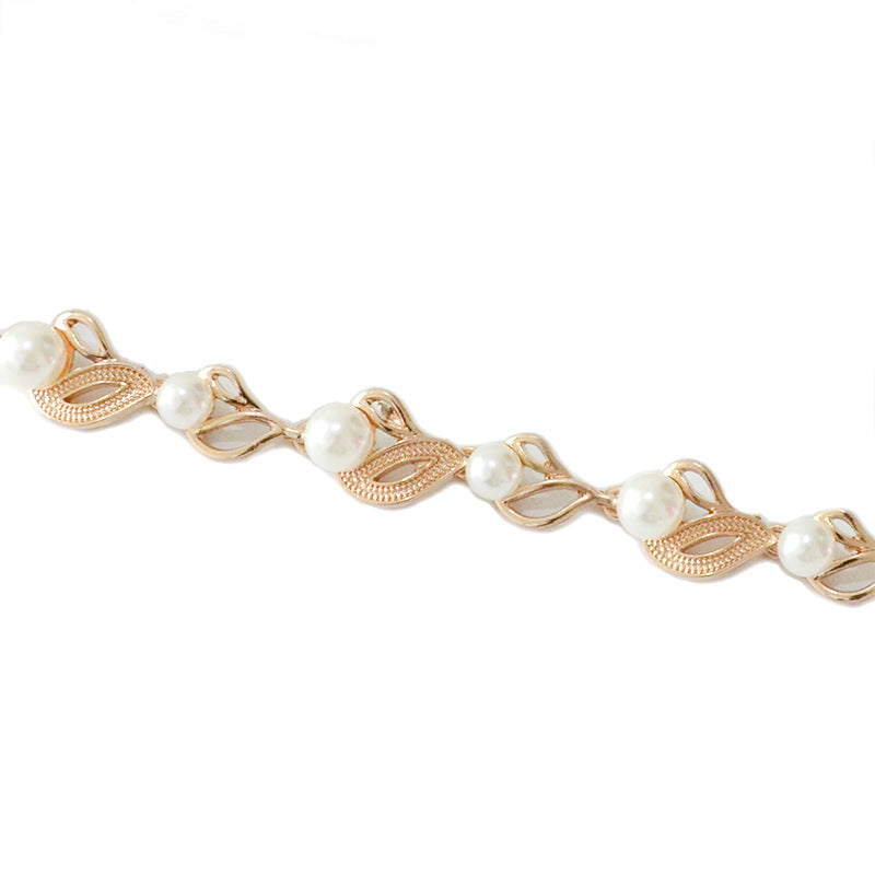 Pearl belt with dress
