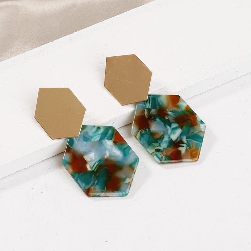 Pendientes sencillos de metal con rombos hexagonales