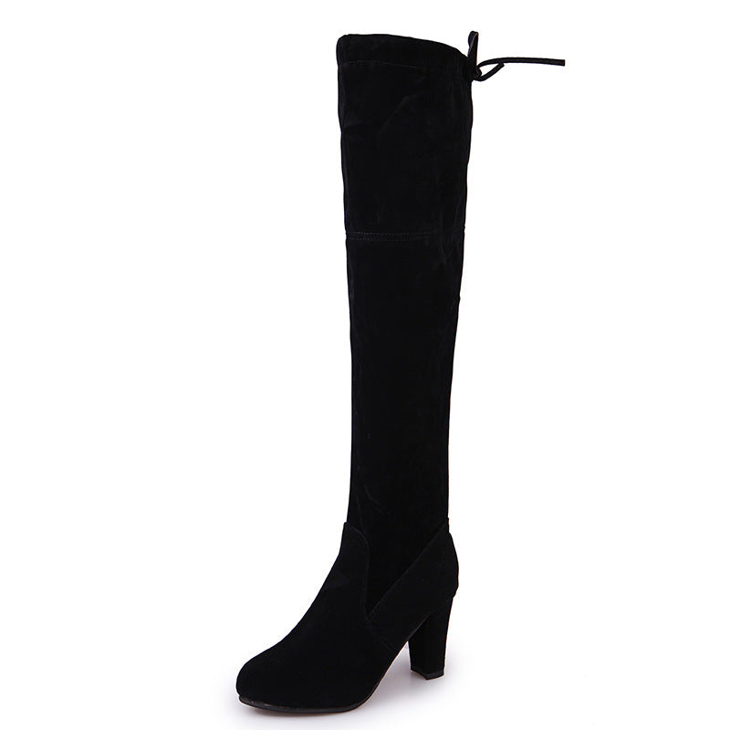Over-the-knee boots and high heels