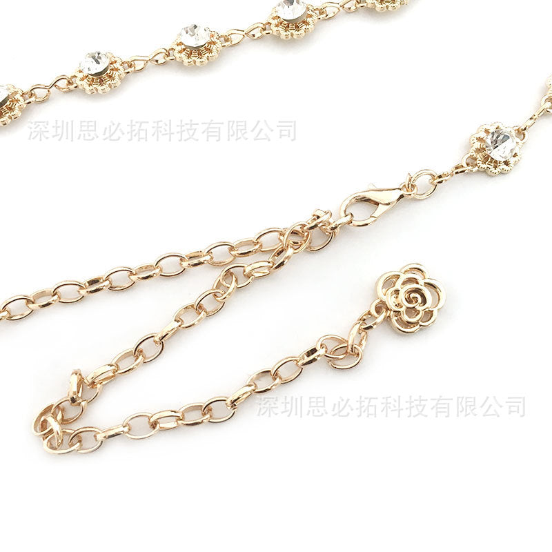 Rhinestone flower decorated gold gift belt