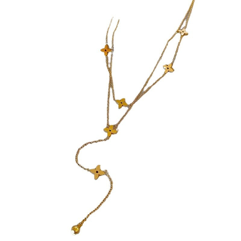 Collar de acero de titanio de doble capa con colgante de cruz y cadena de borlas