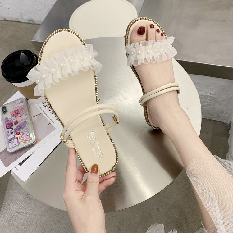 Two pearl slippers