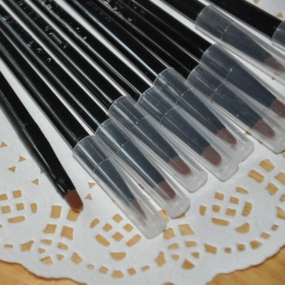 Pincel delineador de ojos portátil con tapa