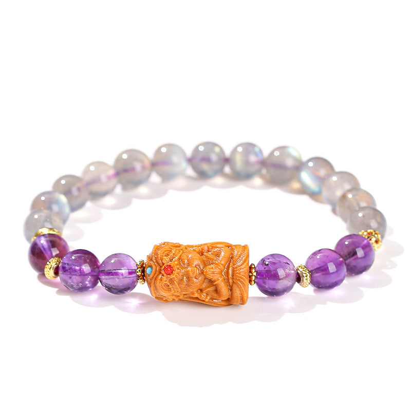 Gray moonstone and amethyst sandalwood Tara bracelet.