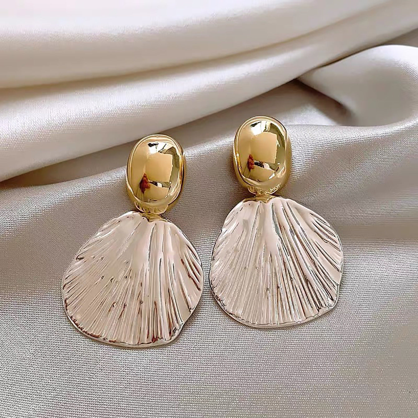Pendientes con diseño de conchas