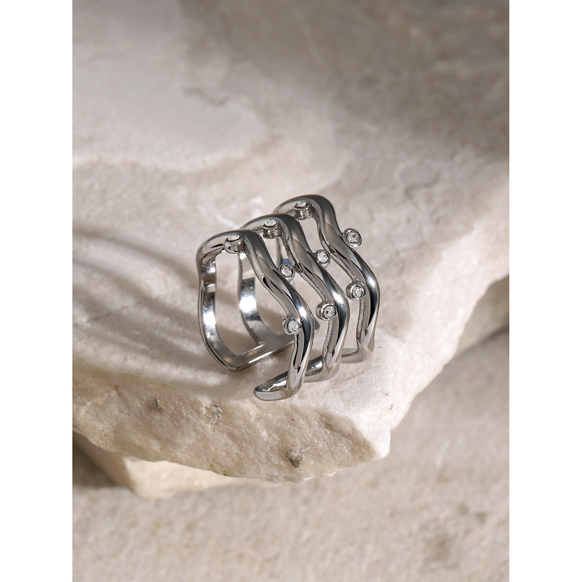 Three-layer ripple rhinestone ring