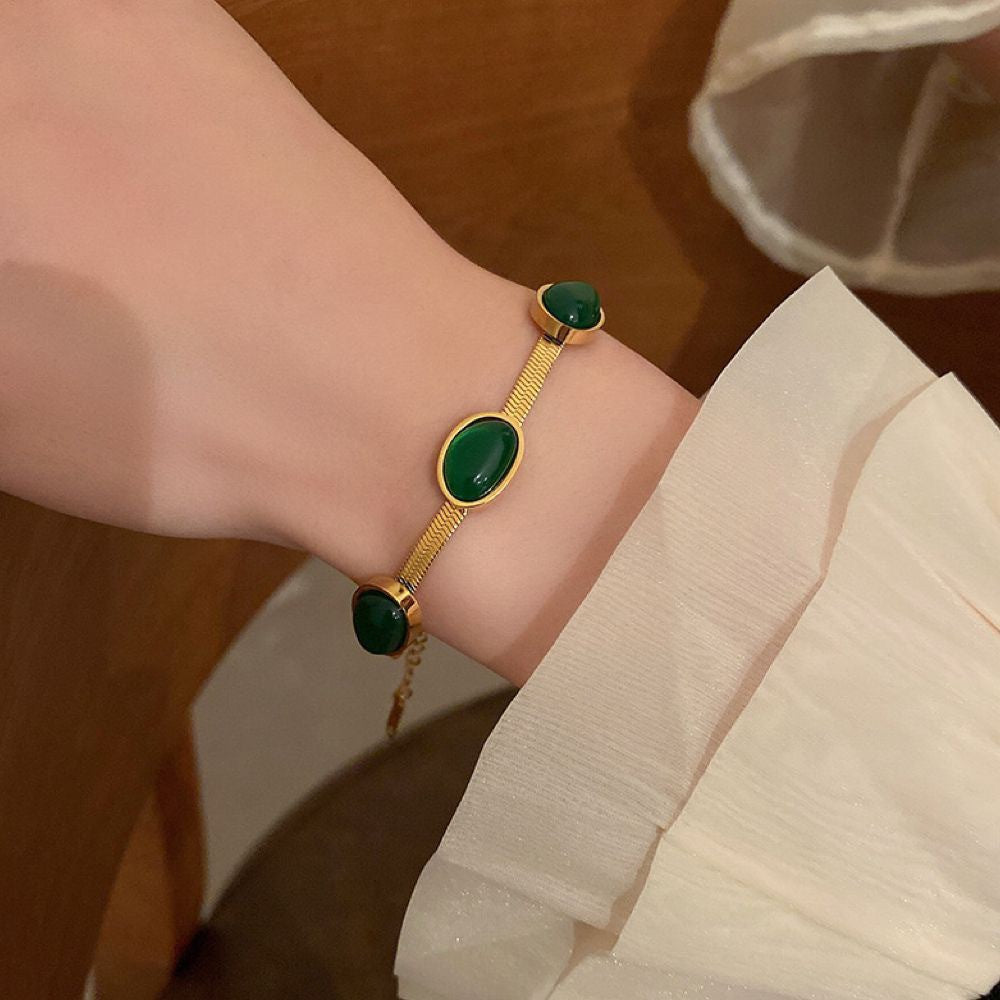 Pulsera de acero y titanio con piedras preciosas verdes estilo vintage