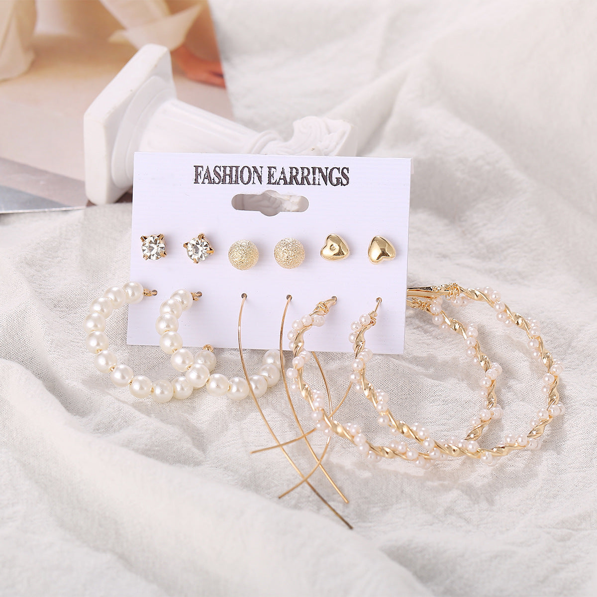 Conjunto de pendientes de cadena con forma de estrella y corazón retro