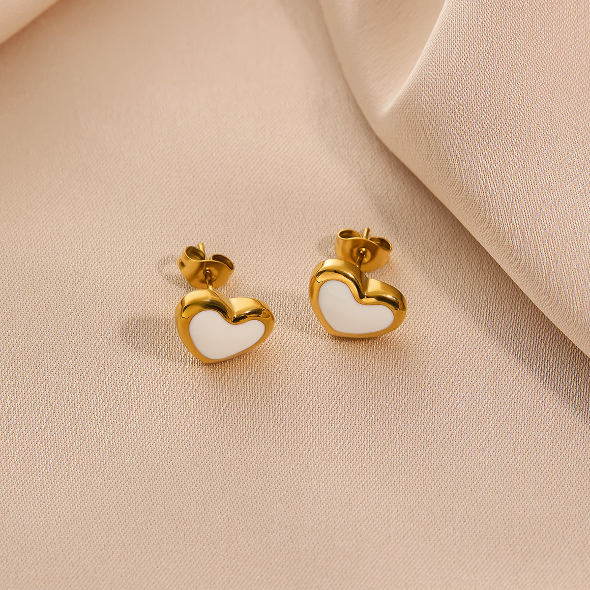 peach heart stud earrings