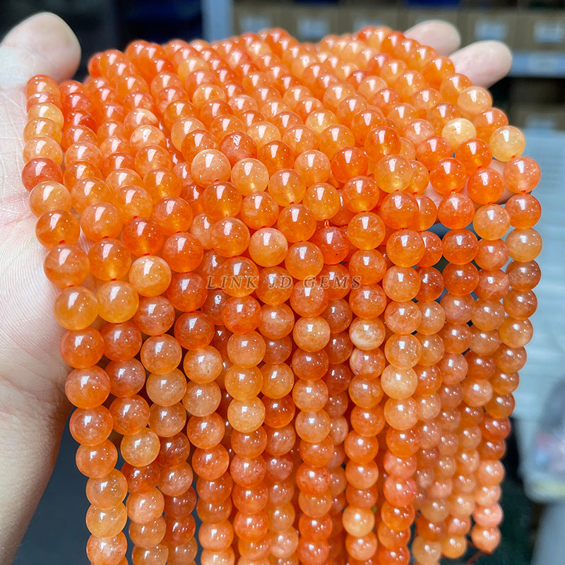 Optimized orange Xinjiang chalcedony loose beads