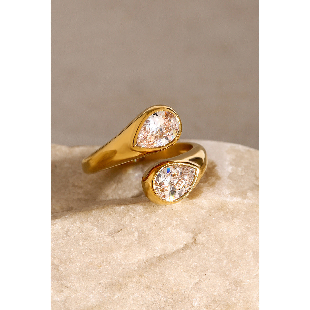 Teardrop-shaped open titanium ring