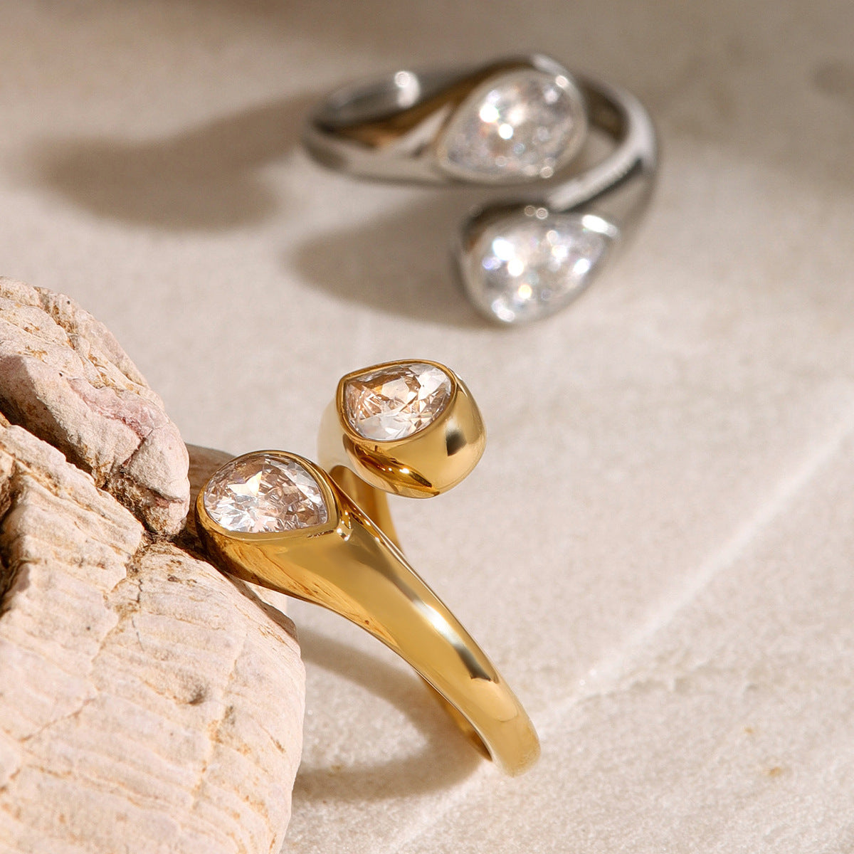 Teardrop-shaped open titanium ring