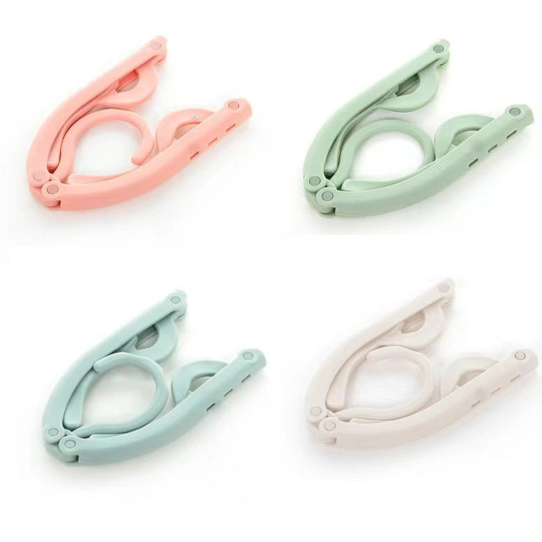 Perchas plegables de plástico portátiles