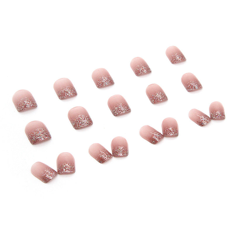 Uñas cortas con efecto espejo y brillo en color rosa