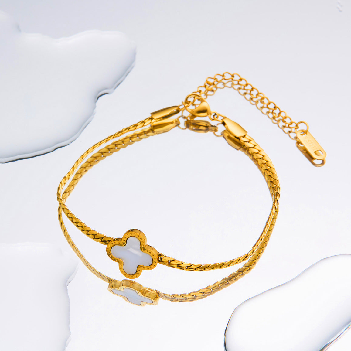 Titanium-Steel Snake Bone Whip Chain Bracelet with Four-Leaf Clover