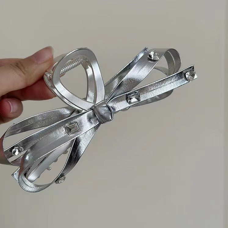 Large silver bow clip