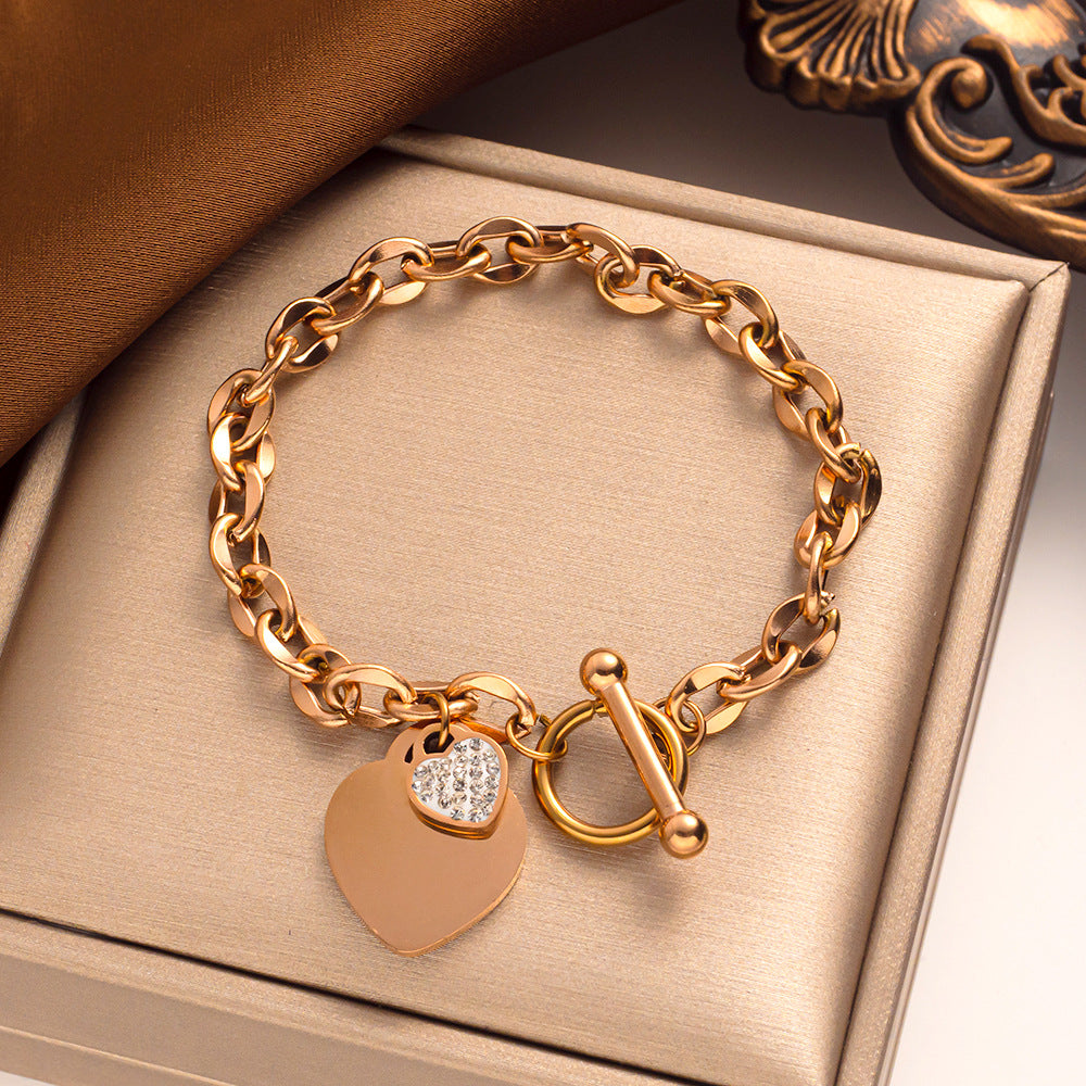 Pulseira Simple Heart Titanium em ouro 18k com fecho em T