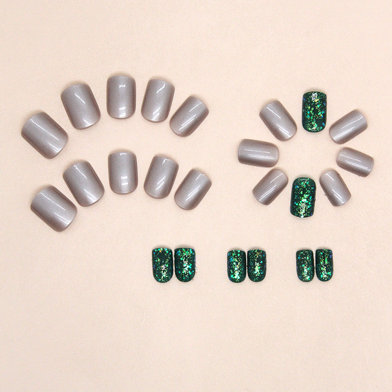 Uñas postizas cuadradas cortas con purpurina Aurora en color verde oscuro