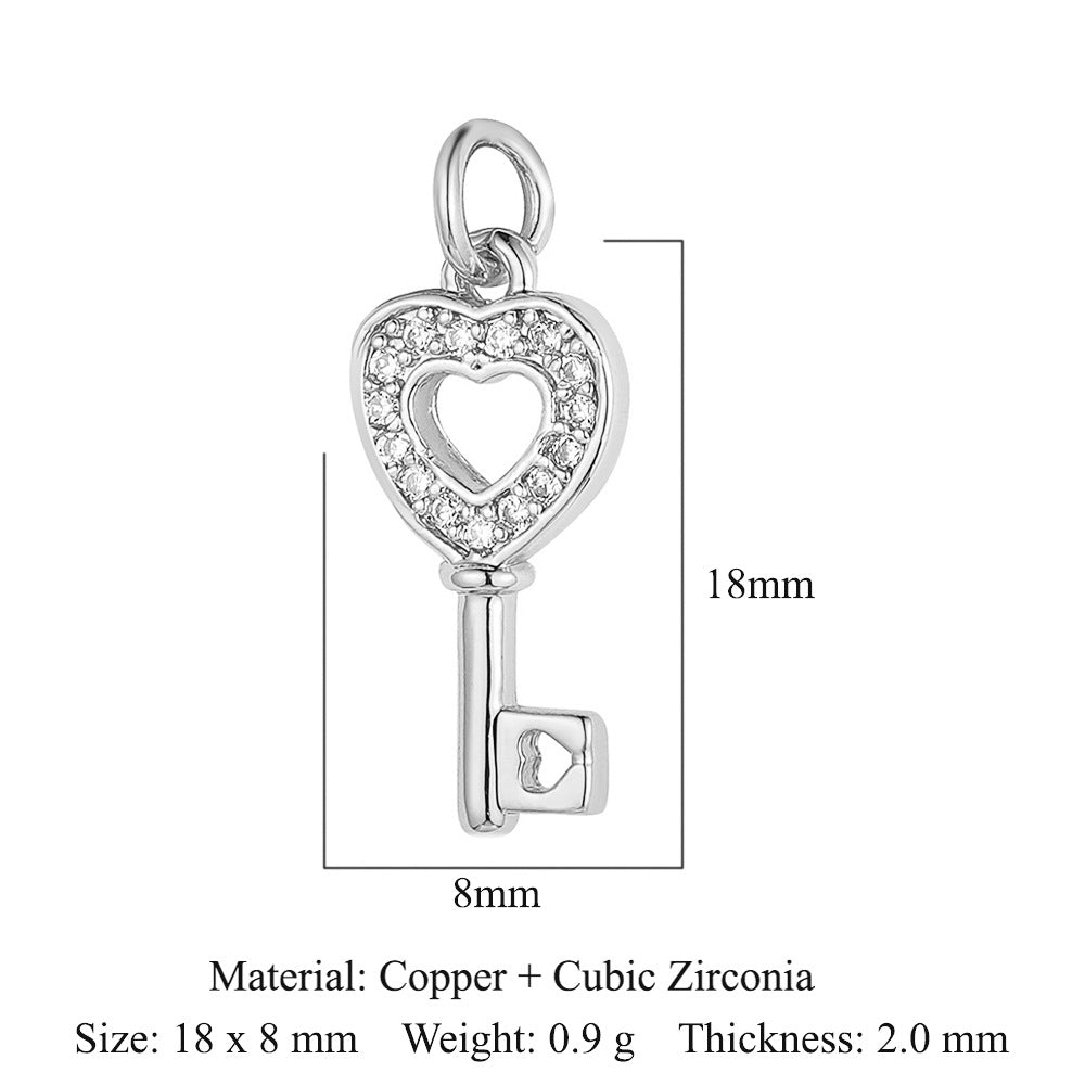 Colgante de cobre y circonita con forma de llave y candado en forma de corazón de melocotón