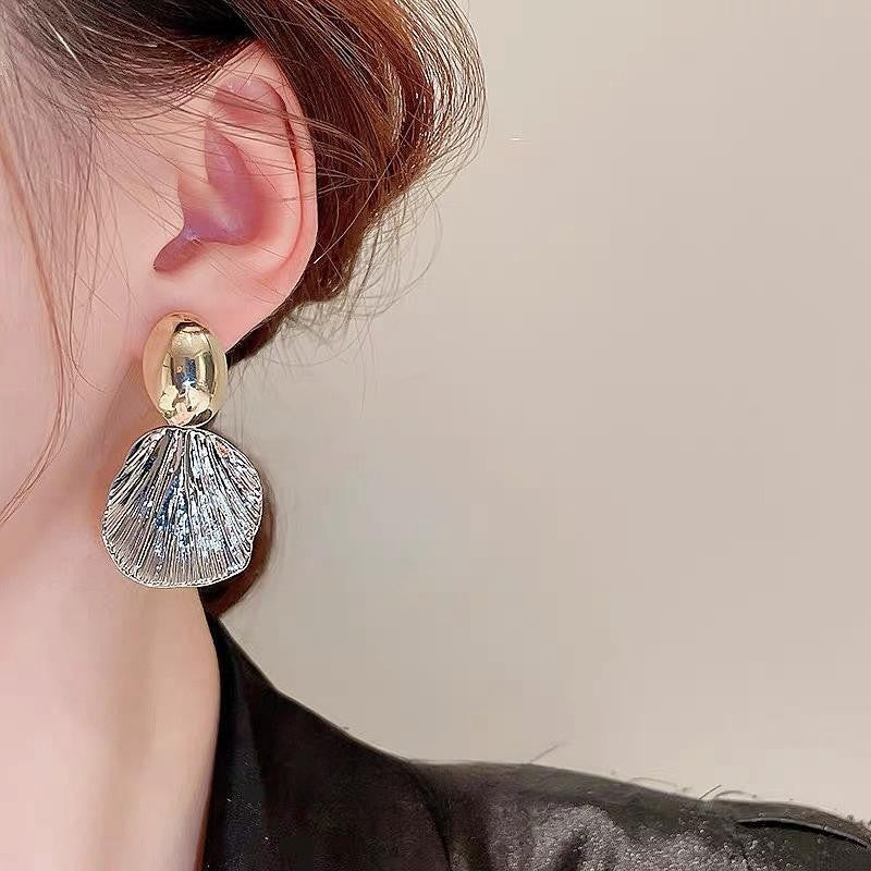 Pendientes con diseño de conchas