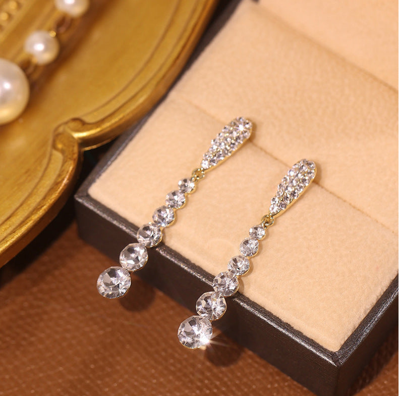 Pendientes largos con flecos de diamantes de imitación y aguja de plata S925