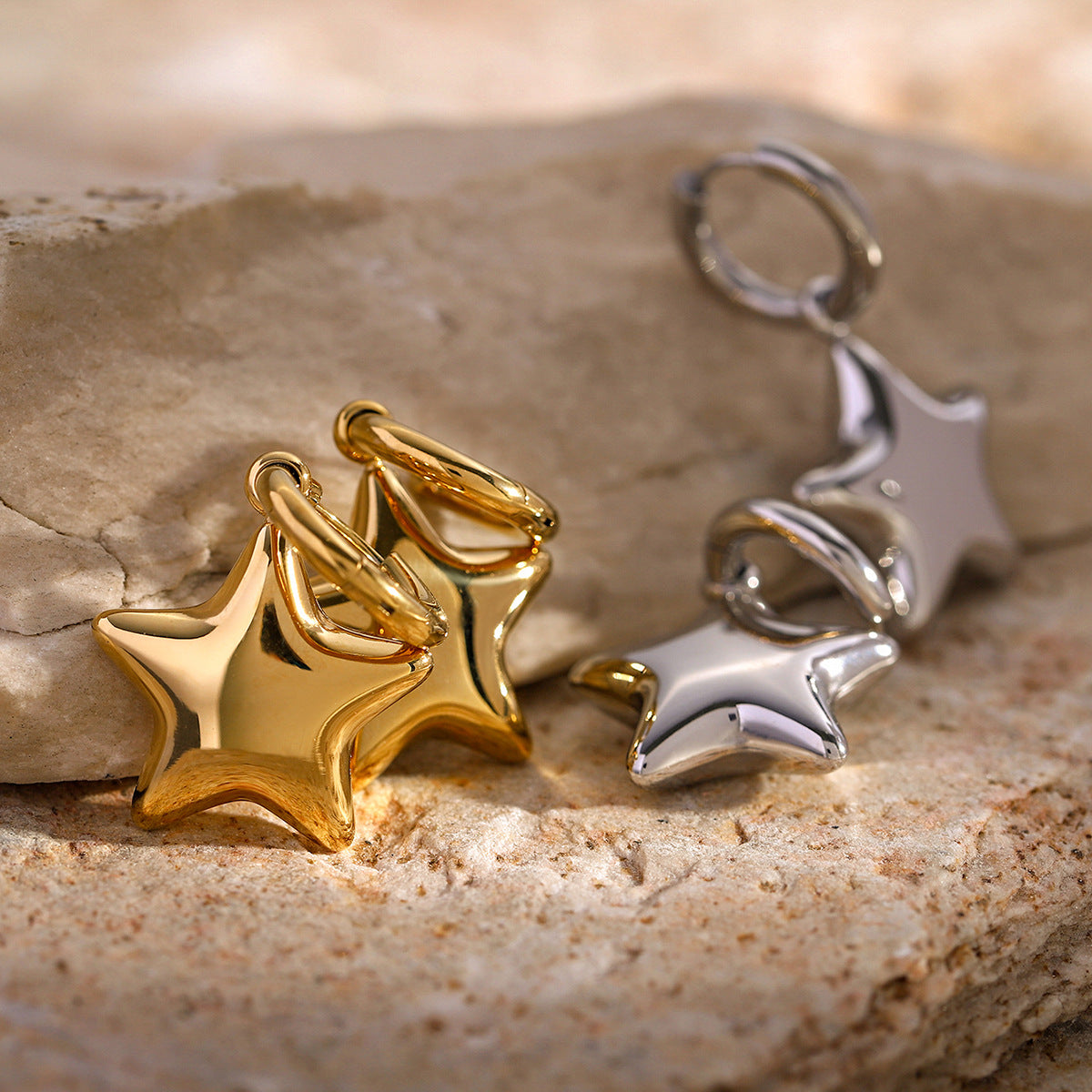 Pendientes tridimensionales de estrella de cinco puntas