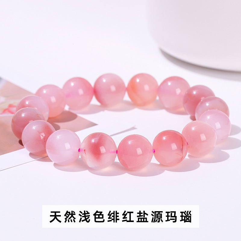 Pulsera de cuentas redondas de ágata con fuente de sal de melocotón