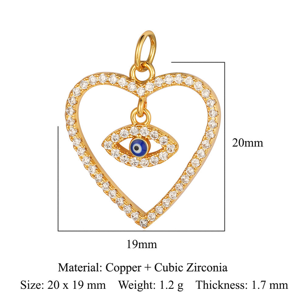 Colgante de cobre y circonita con forma de llave y corazón de melocotón