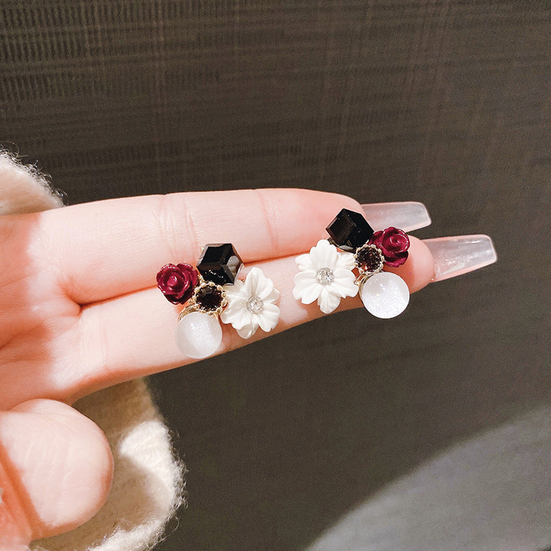 Pendientes de flores de cristal morado