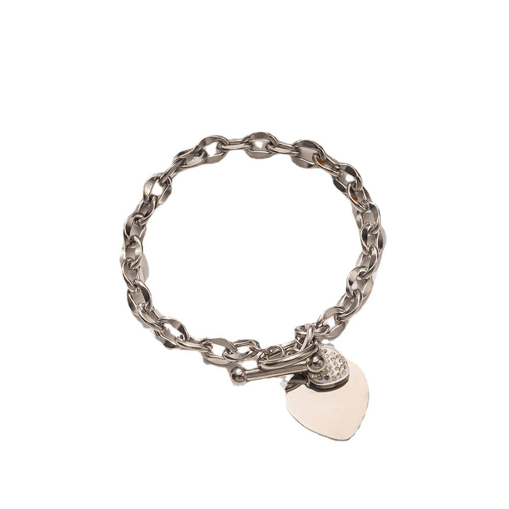 Pulseira Simple Heart Titanium em ouro 18k com fecho em T