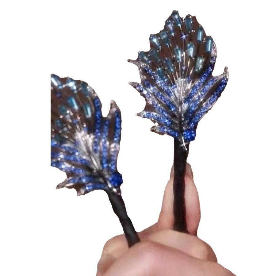 Blue feather hair reel, headdress