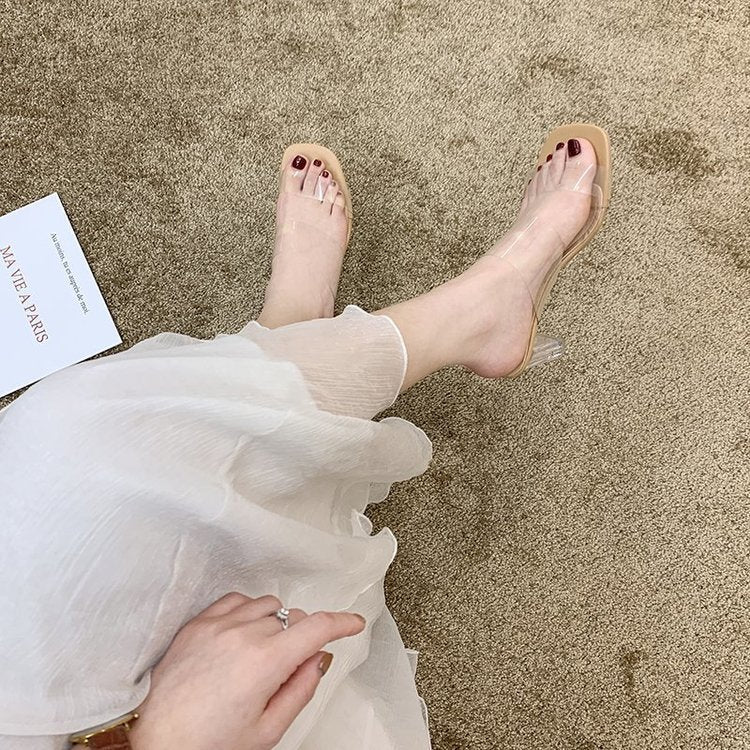 Transparent word with sandals woman