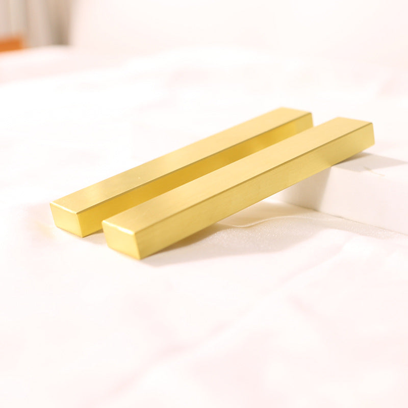 Solid brass paperweight ruler ornament