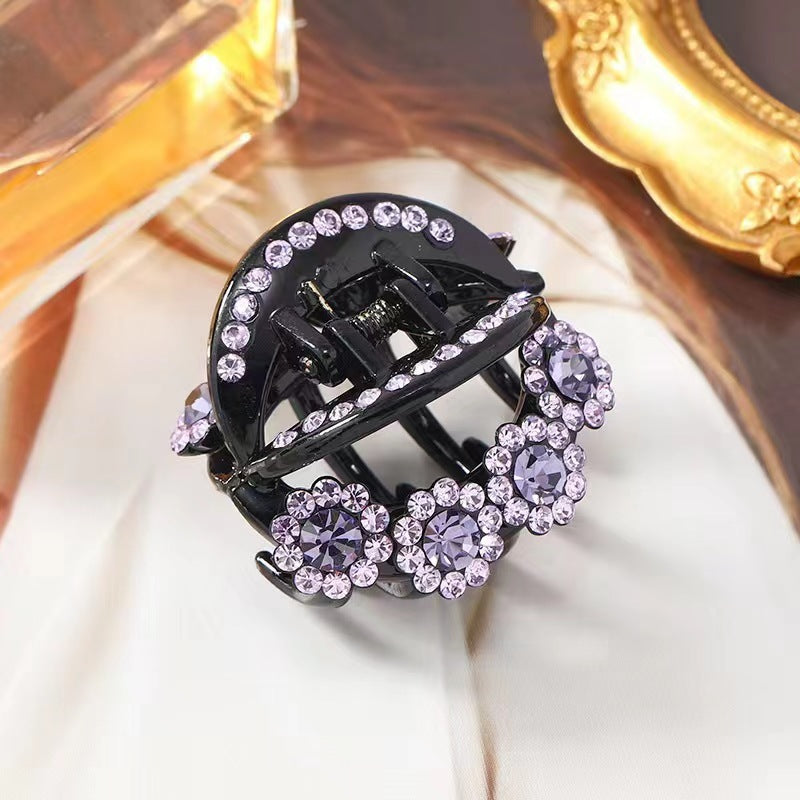 Pinza con forma de garra con diseño floral y diamantes de imitación