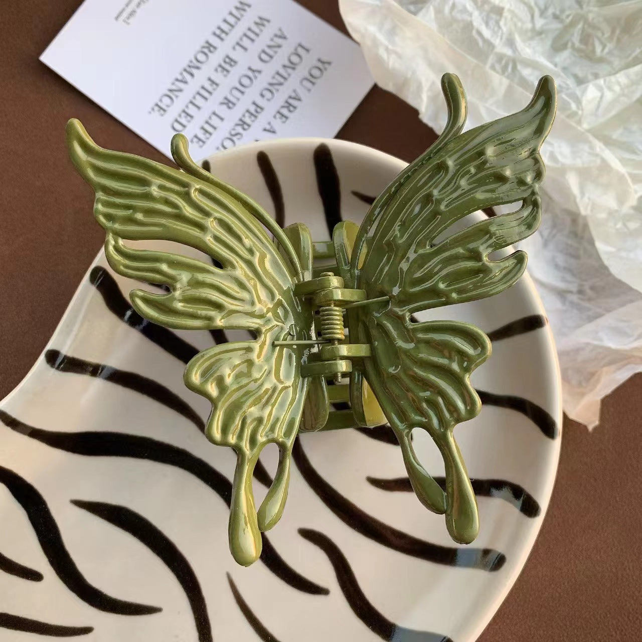 Pinza de agarre con forma de mariposa tridimensional