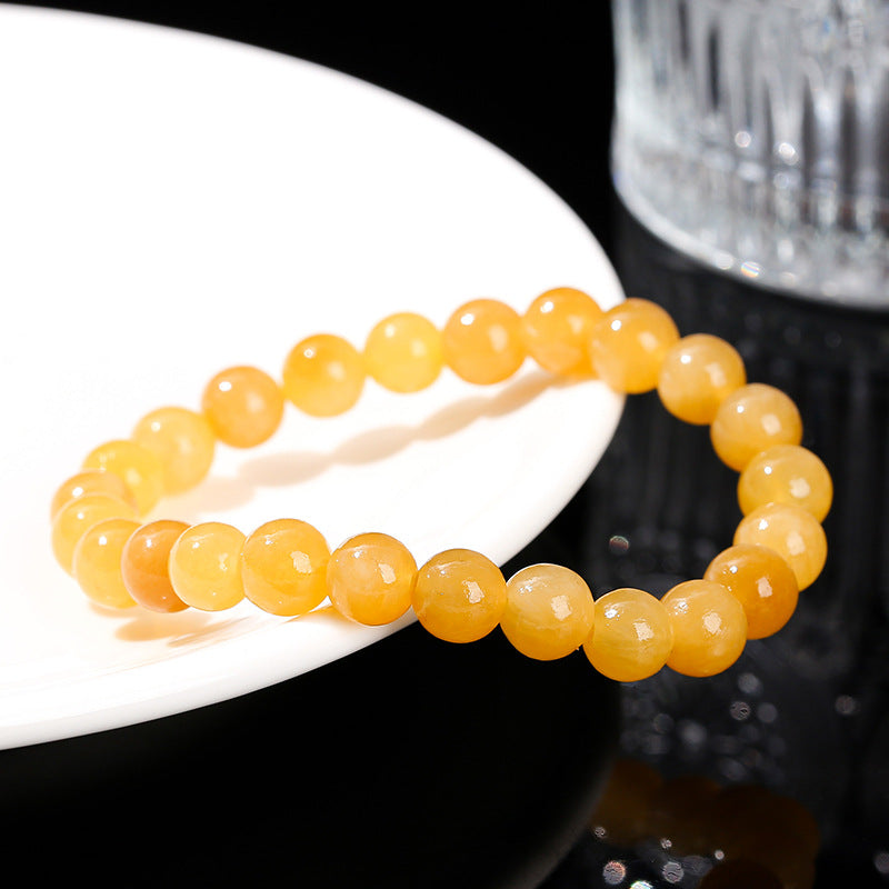 Optimized sugar color Xiuyu bracelet, topaz round beads.