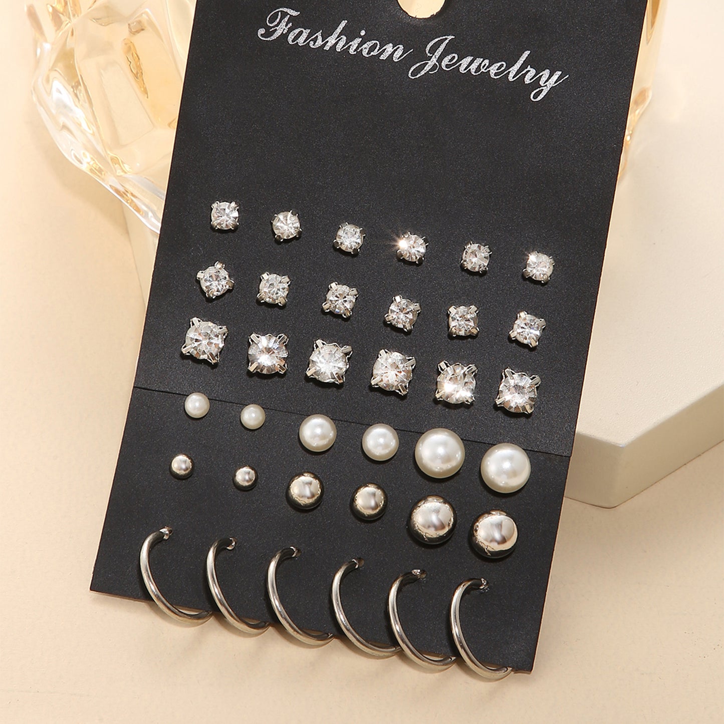 Pearl and zircon earring set 18 pieces