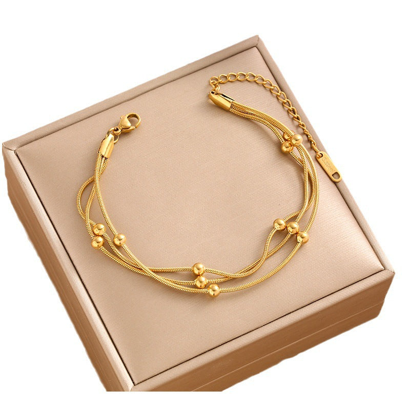 18K gold double-layer small round bead transfer bead bracelet