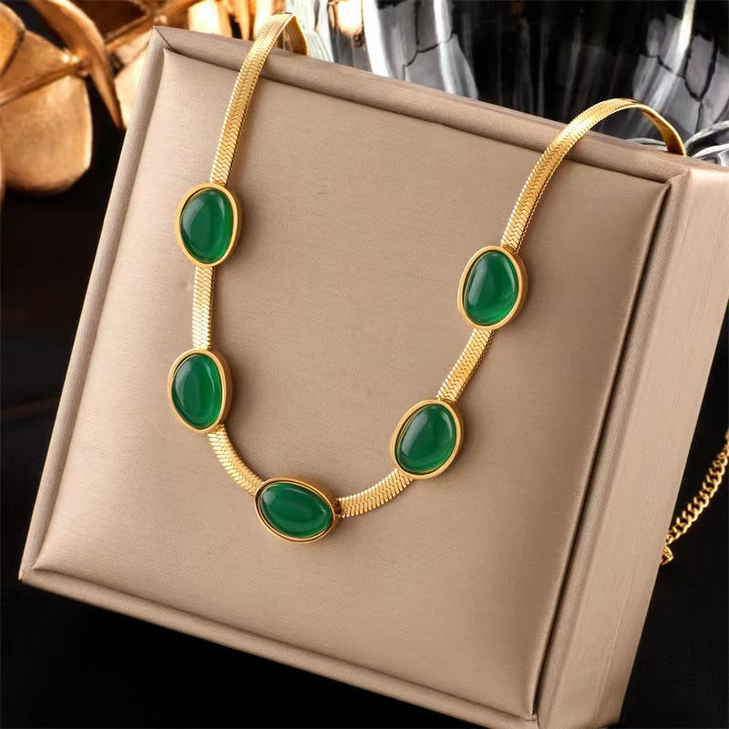 Pulsera de acero y titanio con piedras preciosas verdes estilo vintage