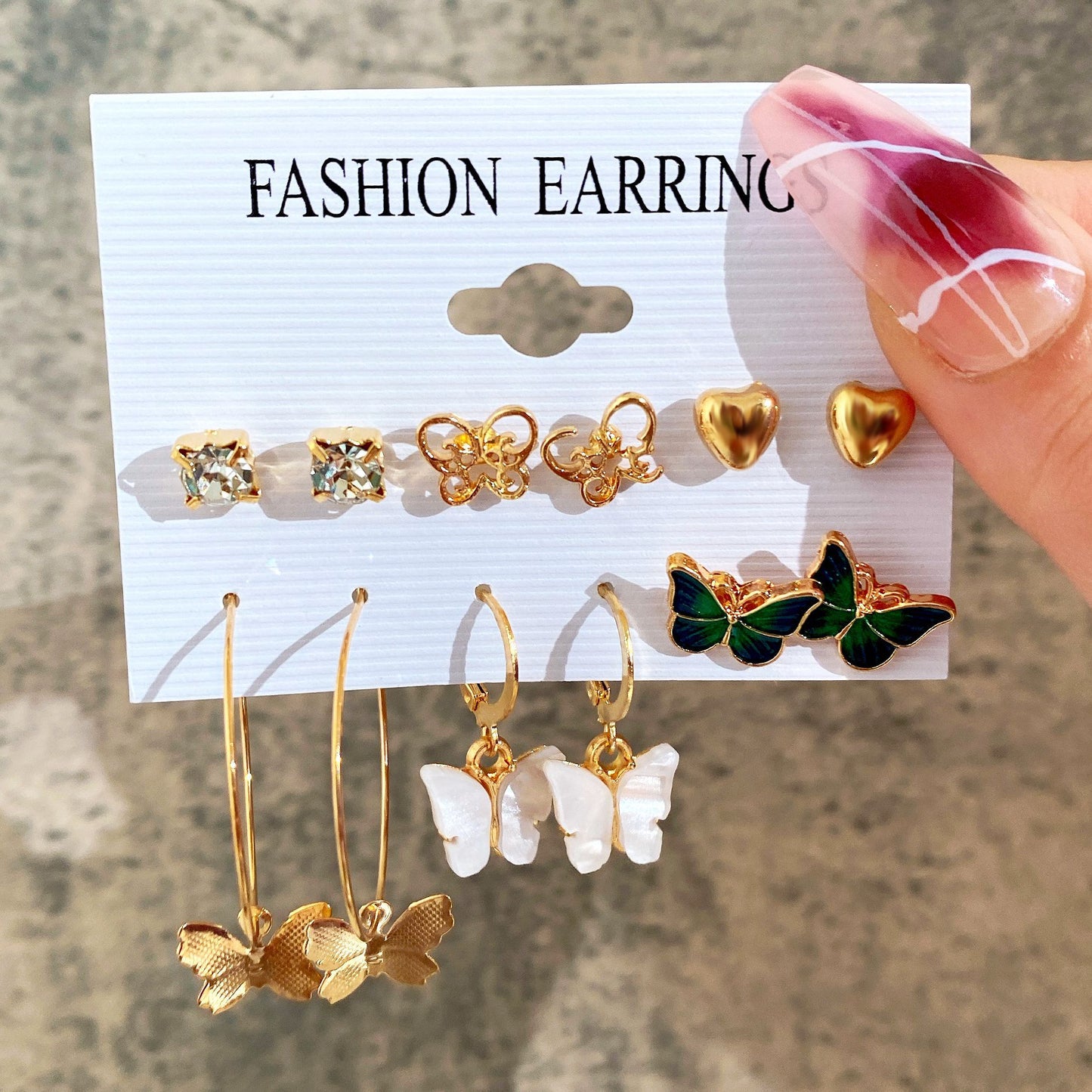 Conjunto de pendientes de cadena con forma de estrella y corazón retro