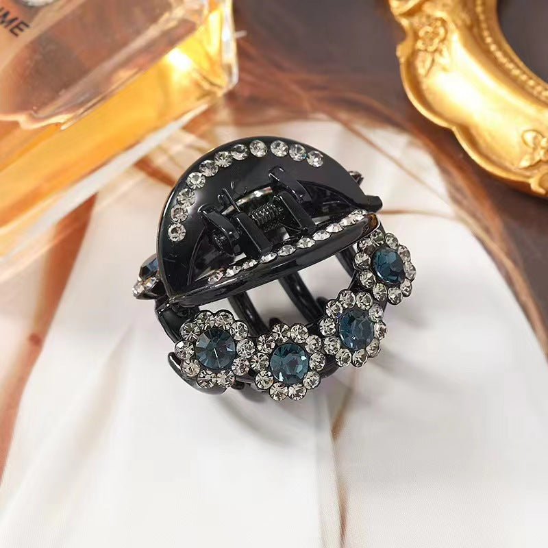 Pinza con forma de garra con diseño floral y diamantes de imitación