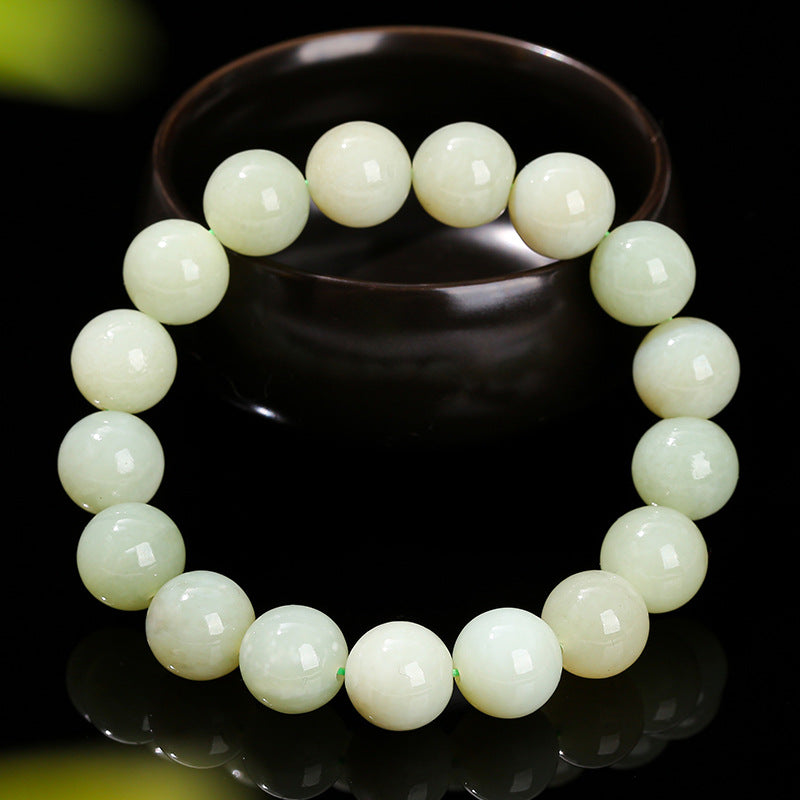 Pulsera de cuentas redondas de jade hetiano de agua clara natural de 12 mm.