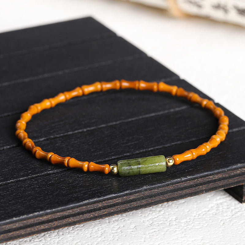 Pulsera fina de cuentas de bambú y hueso de aceituna