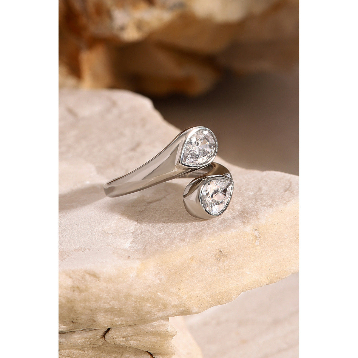 Teardrop-shaped open titanium ring