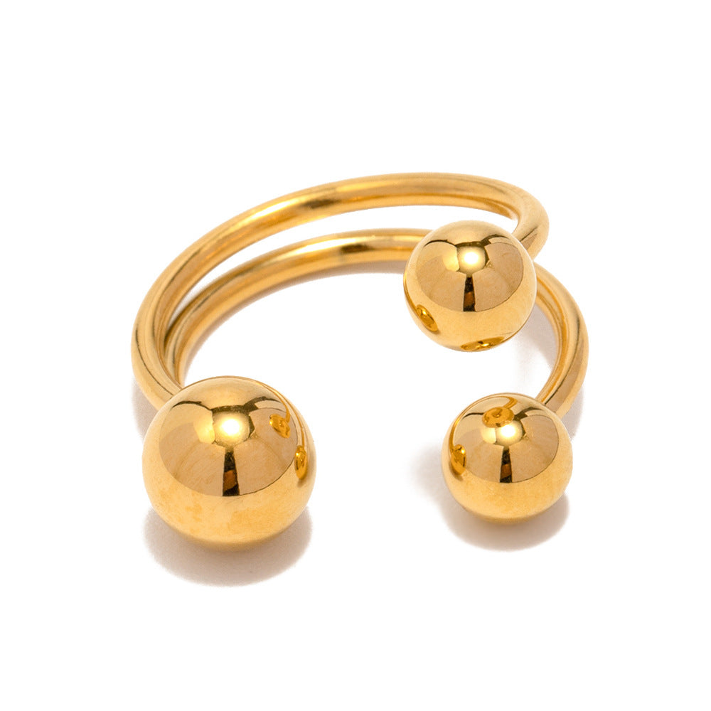 Anillo abierto tres bolas oro