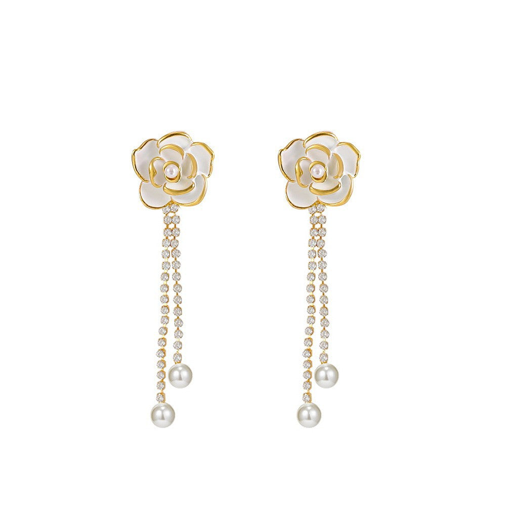 Diamond-encrusted black camellia earrings for women