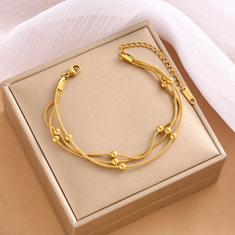 18K gold double-layer small round bead transfer bead bracelet